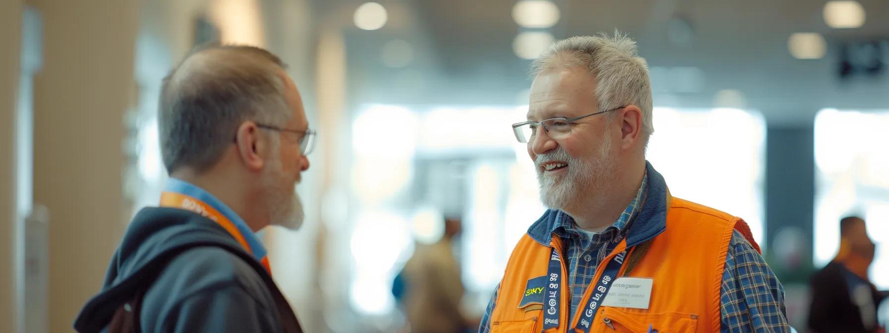 a construction professional engaging in a conversation with a potential client at an industry seminar.