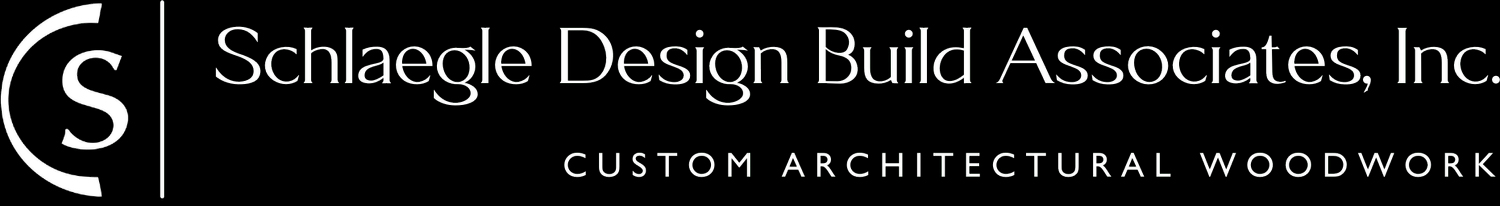 Schlaegle Design Build Associates, Inc. logo featuring custom architectural woodwork design, relevant to construction marketing services by AltCMO.